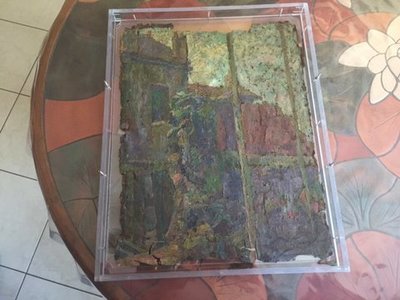 Descubren un Monet pintado en una caja de pizza